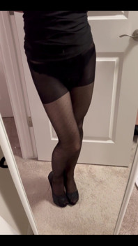 Looking Self in the Mirror in the Poka Dots Black Pantyhose.