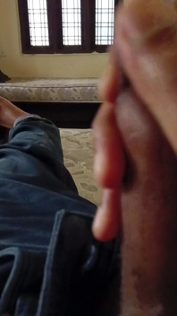 Masturbating