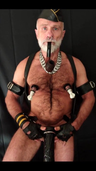 Stepdad Playing with Strap-on While Smoking His Pipe