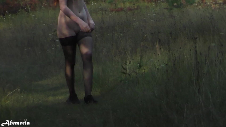 Afemeria: Lustful brunette undresses in the woods and walks naked