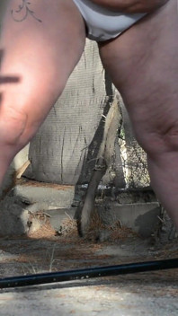 Pissing White Knickers Outside in Bondage