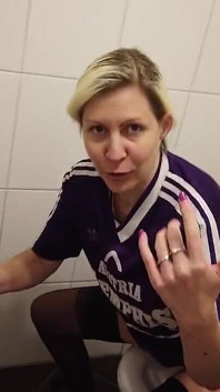 Blonde Sporty MILF Pisses in a Cup Wearing a Sports Jersey, Then Her Man Slurp the Piss