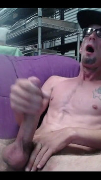 Masturbating