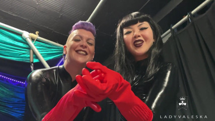 Lady Valeska: Latex Dommes invite you to suck their huge strap ons