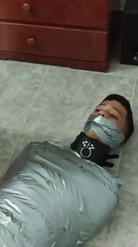 Latino Hunk Heavily Mummified by Cooperative Femdom Women