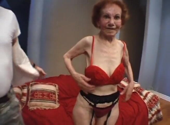Gilfy Pleasure: Redhead granny banged by two guys