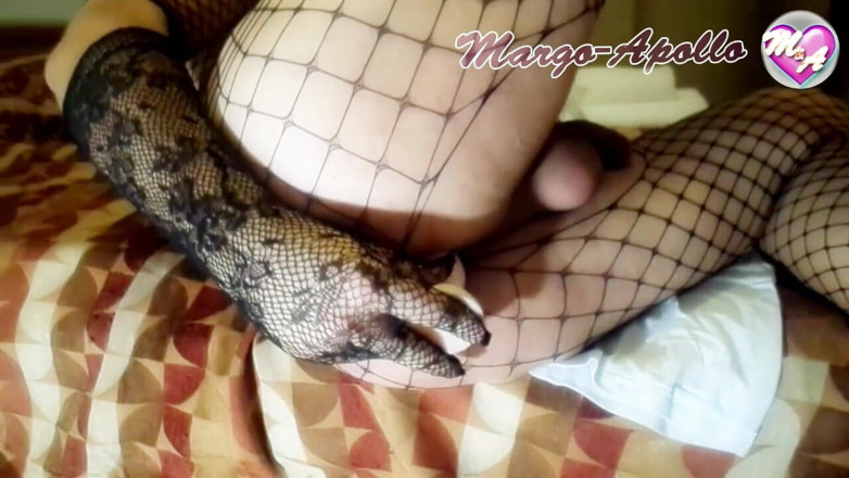Margo Apollo: Sissy with butt plug on the sofa