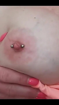 私の巨乳とピアス乳首に唾を垂らして
