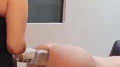 She Pushes a Bottle Into Him