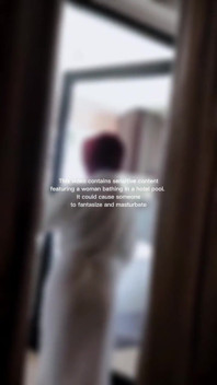 Woman Hijab Bathing Naked in an Open-air Hotel Pool