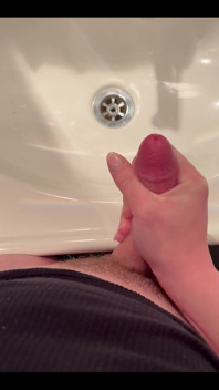 Masturbating