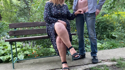 Thumbnail of SHE holds his cock while HE pee in the park