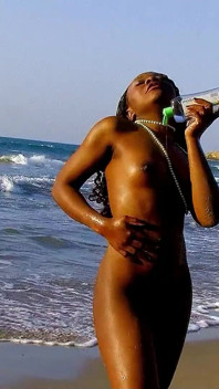 Ebony teen Nancy fucked by strangers on vacation on the beach
