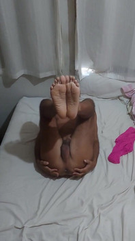 Ladysmith Doing a Striptease in Bed Showing off Her Tanned Ass with Sexy Mark