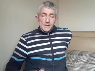 Masturbating in Tracksuit Top.