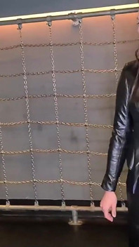 Leather Mistress Canes the Slave