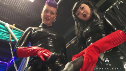 Lady Valeska: Latex Dommes invite you to suck their huge strap ons