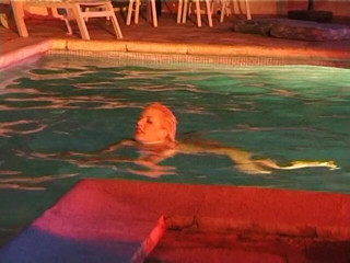 Naughty Girls: Two sexy lesbian chicks are swimming together in the swimming...
