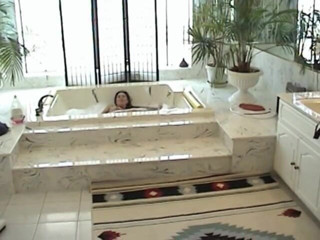 Outdoor pervs: Petite babe takes sexy bubble bath