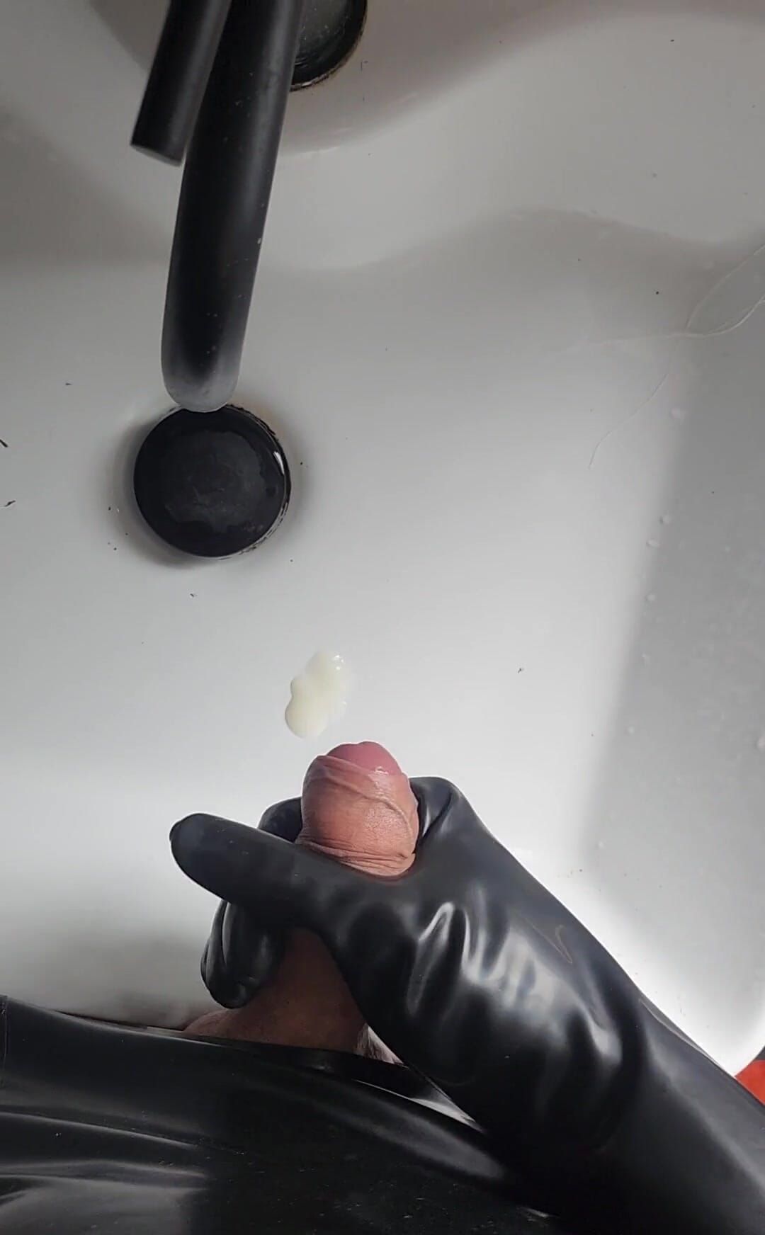 Cumshot in Black Gloves