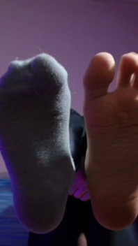 Puppy Keeps Teasing You with His Socks and Bare Paws