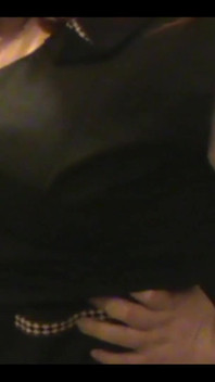 Robe-wearing Dominatrix