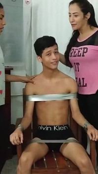 Chair Bound and Tickled by Three Microfoamly Tape Gagged Girls!