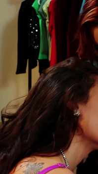 Brunette and Red Headed Lesbians Eat Shaved Pussy in a Store