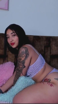 Tattooed Woman with a Delicious Ass