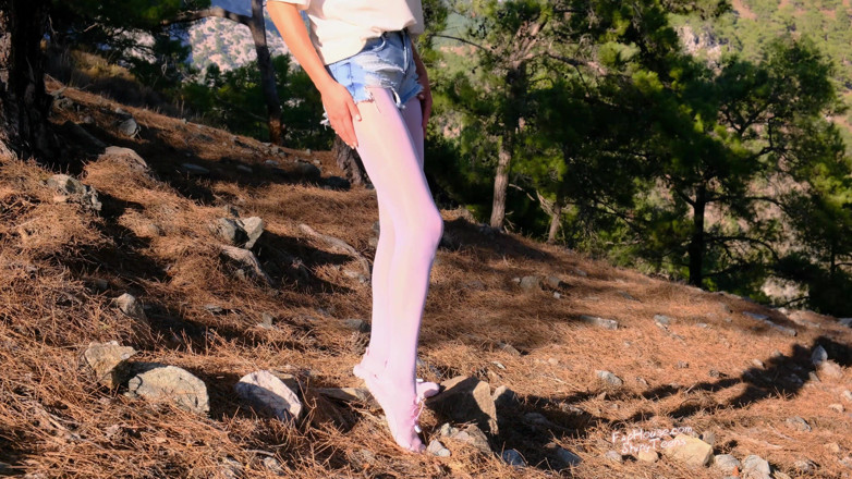 Shiny teens: Shiny white pantyhose and jeans minishorts outdoor