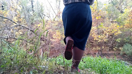 Elena: MILF pissing in a park