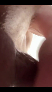 Masturbating