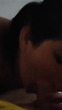 Stepmother Sucking Her Stepson in Secret and When Her Cuckold Husband Is Distracted Watching the Game.