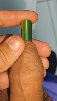 Alkaline Battery Completely Inserted Into the Cock.