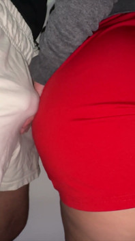 Big-assed Woman Touches the Erect Cock of a Stranger.