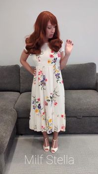 A Redhead in a Dress