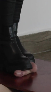 The Orgasm of a Slave Under Mistress Cassy's Boots