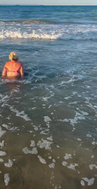 Try Not to Wet My Hair While Play with the Waves