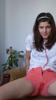 Sexy Teen Has Full Bladder and She Is Desperate to Pee so She Empty Her Bladder in Her Short Pants