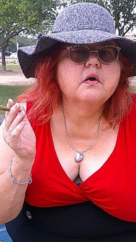 Nurse Vicki Smoking in the Park on a Bench All Dressed up