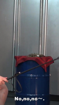 Mistress Whips Male Masochist Who Is Holding Dildo in His Mouth to Prevent It From Falling Out of Female Masochist Pussy