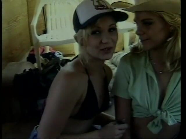 Cumming Soon: Two hitchhiking blonde babes share stud's cock in the back...