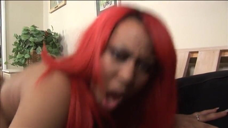 Porncentro: Curvy redhead gets nailed doggy style on the sofa
