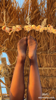 The Best View on the Beach Is Not the Sea, but My Feet in Black Tights Hanging Over Your Head