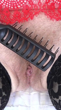 Mature Hairy Pussy Cums From a Comb Close-up. Amateur Fetish with a Plump Pubic Mound and Bush.