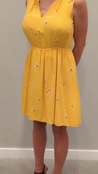 Stella in a Yellow Sun Dress with Black Heels