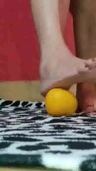 Feet, oranges and high heels