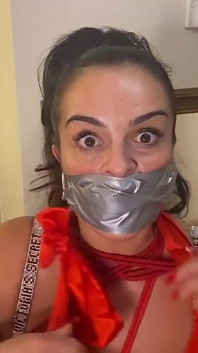 Latina Tied up and Gagged with a Tape Wrap (smaller Size)