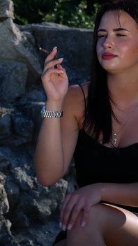 Sexy Brunette Babe Is Smoking