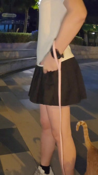 Caged Sissy with Anal Toy Walking the Cat